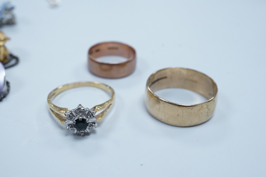A 1970's 9ct gold wedding band, size W, a George V 9ct rose gold wedding band, 9.3 grams, a 1970's 18ct gold sapphire and diamond cluster ring, gross weight 4 grams, a modern silver mounted photograph frame, a modern sil